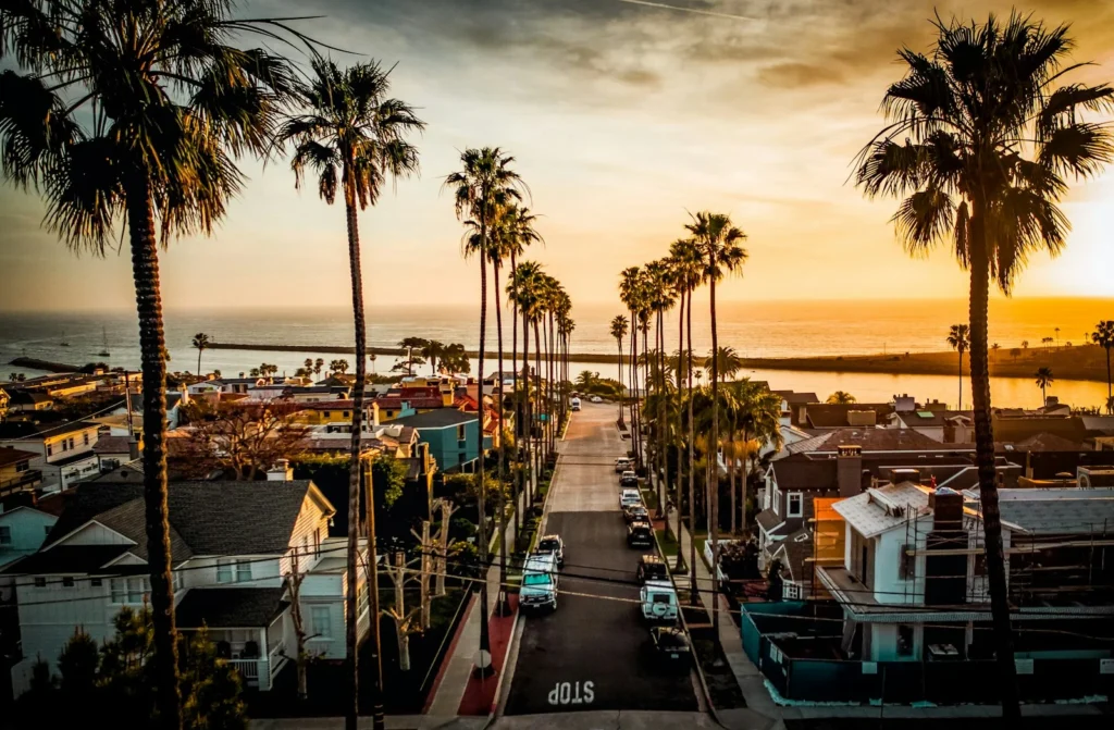 Newport Beach coastline — 2026 rental rate guide by neighborhood for Orange County owners