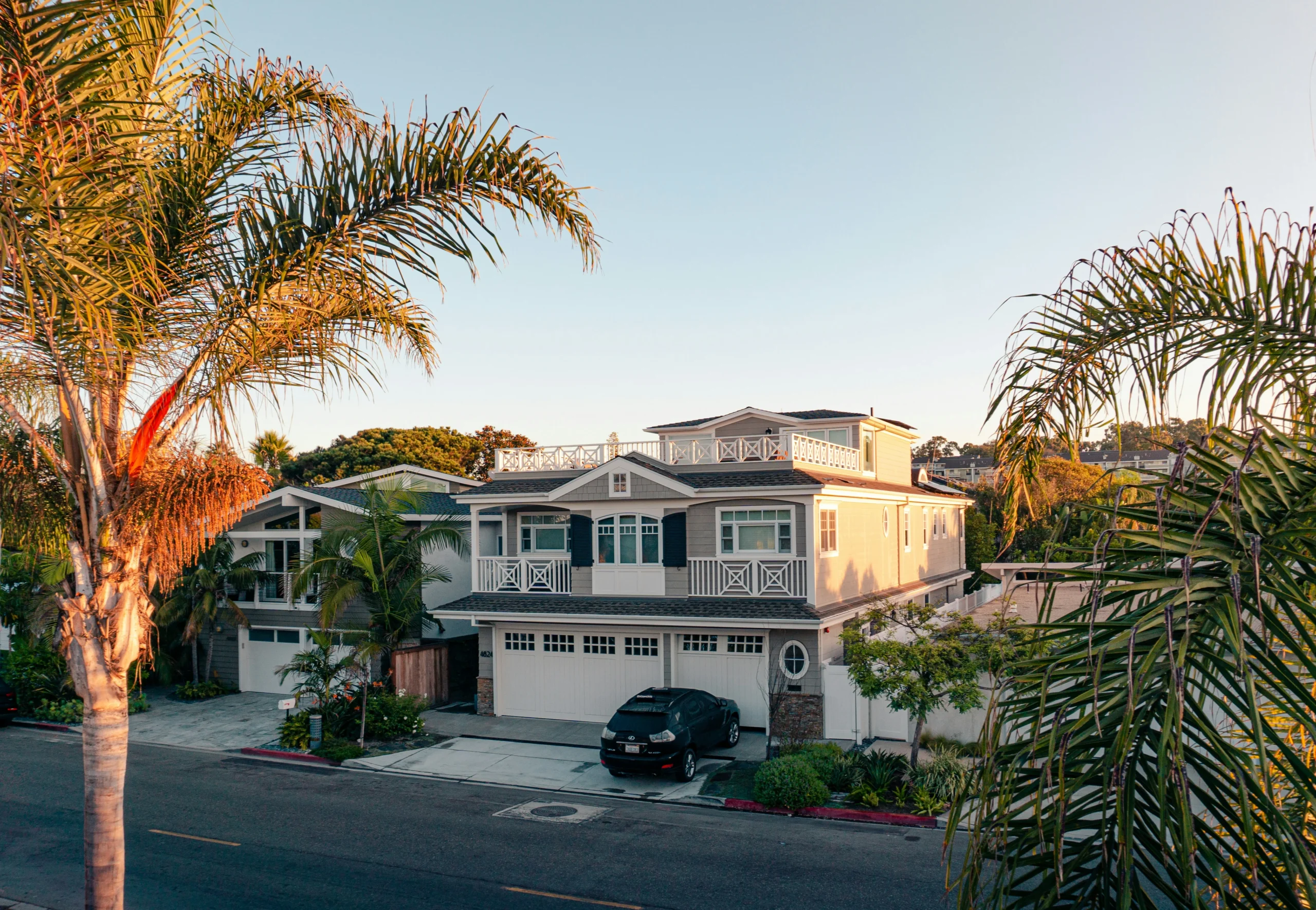 A landlord handling rental paperwork and tenant calls at home — the realistic time commitment of self-managing