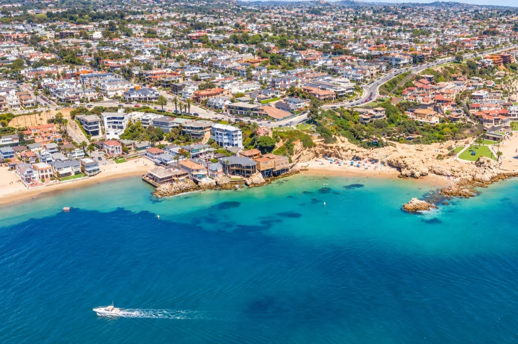 Palm-lined coastal street in Corona del Mar representing the 2026 rental market