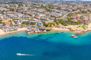 Palm-lined coastal street in Corona del Mar representing the 2026 rental market